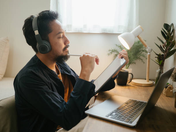 istock Businessman working from home. 1311961511