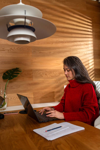 istock Young businesswoman at work at her workstation 1311962609