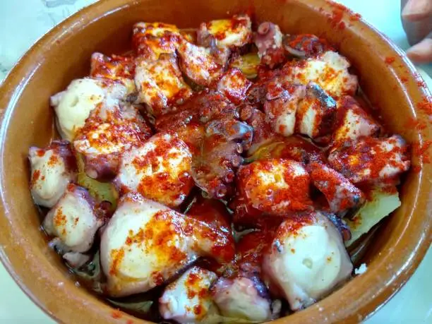 Pulpo a la Sanabresa, octopus cooked with paprika, garlic and salt, Sanabria, Zamora, Spain