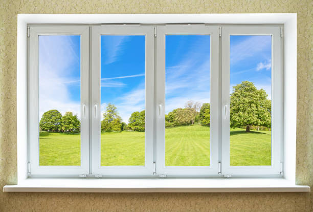 istock View through a modern PVC window onto beautiful spring landscape 1311965682