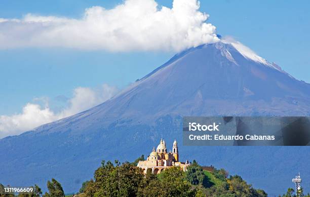 Popocatepetl Volcano On The Sanctuary Of Our Lady Of Remedies In Cholula Mexico Stock Photo - Download Image Now