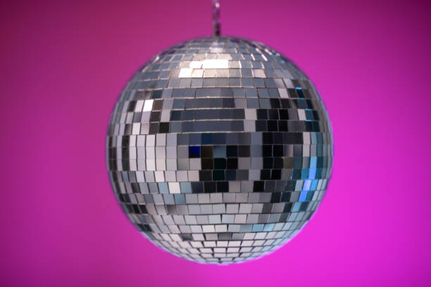 istock Disco Ball party music event equipment on pink wall 1311967005
