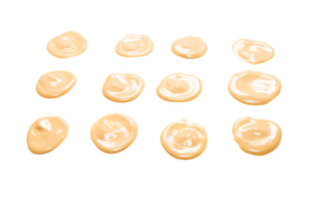 istock Mushroom sauce splashes isolated on white background. 1311969416