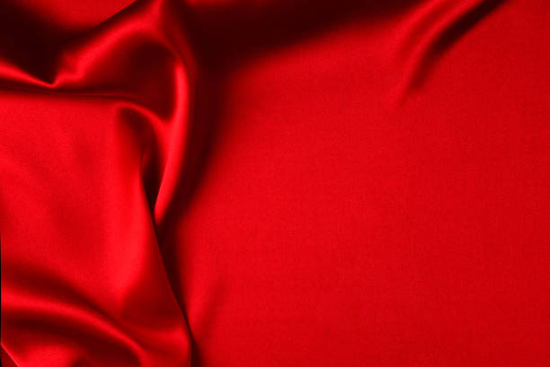 istock Red silk or satin luxury fabric texture can use as abstract background. Top view 1311969433