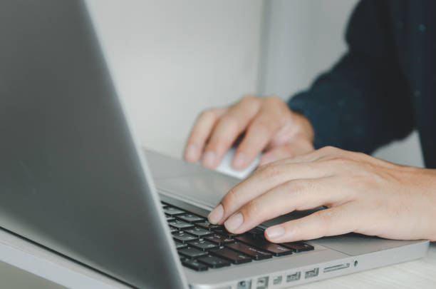 istock business man typing on keyboard computer laptop. 1311969762