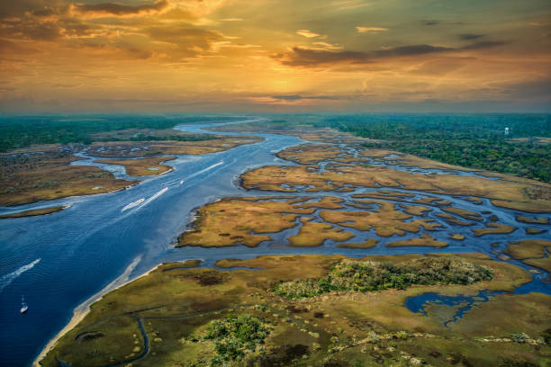 Aerial View of Sunset over Intracoastal Waterway at Jacksonville Beach Florida OcuDrone Aerial Landscape Collection canal stock pictures, royalty-free photos & images