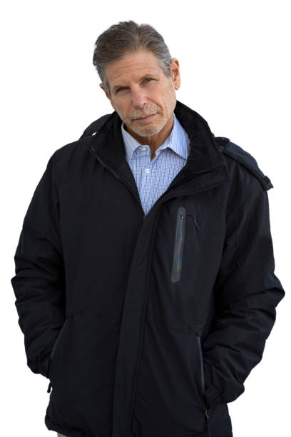 istock Man in jacket looking at camera with serious look 1311972229