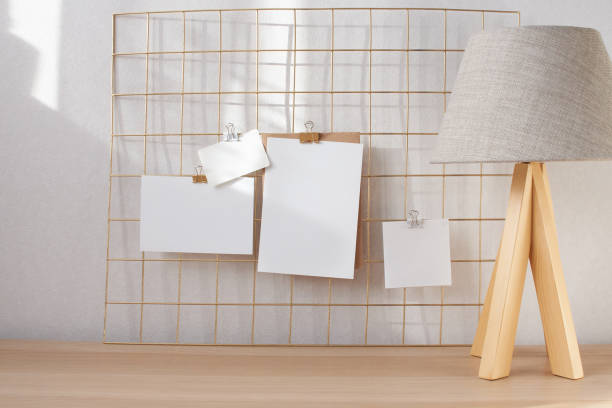 istock Poster, cards mock up attached on gold grid board with binder. 1311973078