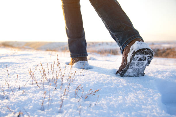 istock man walking in the snow 1311973467