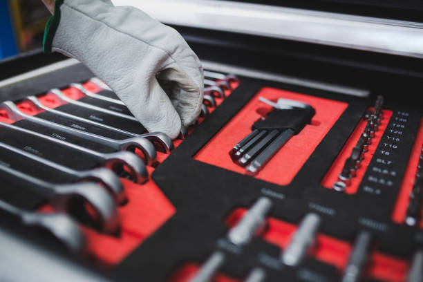 Set of the professional tools. Closeup of chrome wrench tools organized in box. stock photo