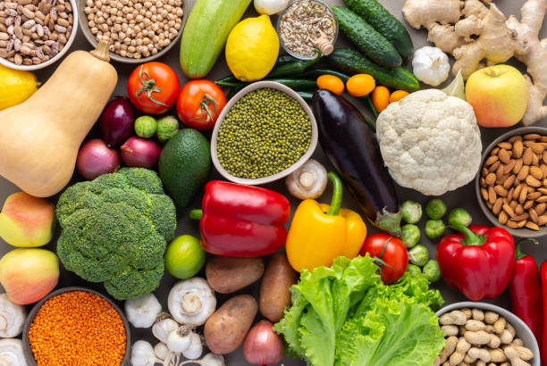 istock Background of vegetables, seeds, nuts and beans 1311973929
