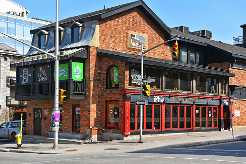 Ottawa, Canada - April 10, 2021:  The Rainbow Bistro in the Byward Market has been around since 1984 and has hosted many respected Blues acts since that time.  It is currently closed due to coronavirus restrictions. iPho a Vietnamese  restaurant is on the ground floor.