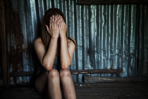 istock Hopeless sad woman cover face by hands 1311975131