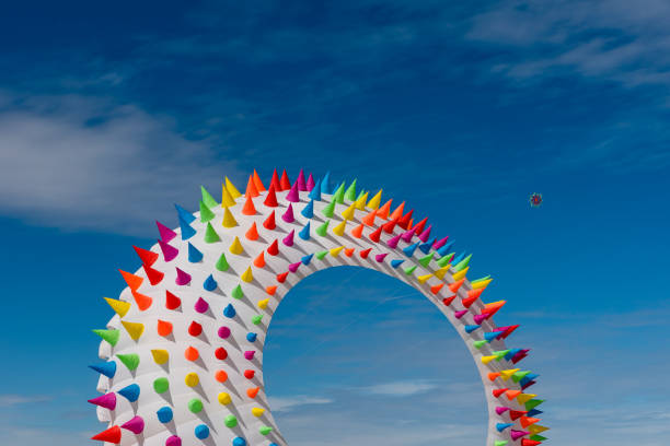 istock Colorful Kites flying over the sky 1311976704