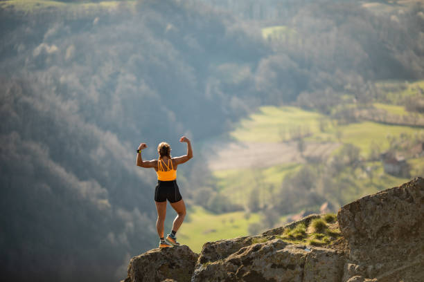 istock Woman running on mountain 1311977311