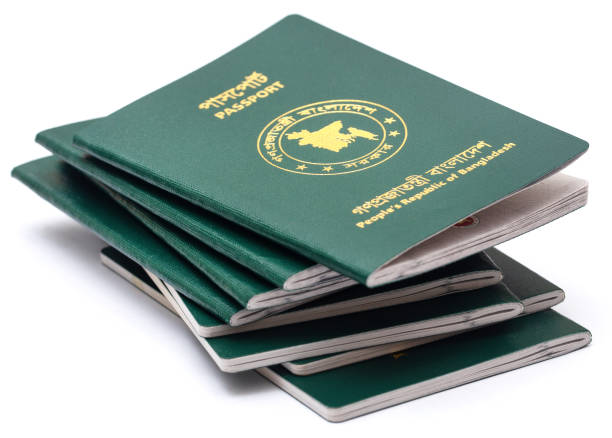 Passports of Bangladesh Passports of Bangladesh over white background bangladesh passport stock pictures, royalty-free photos & images