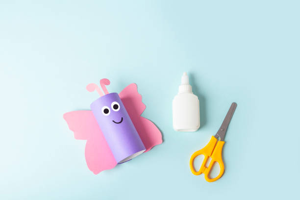 istock DIY and kids creativity. Step by step instruction: how to make butterfly from toilet roll tube. Step3 glue the wings, antennae and eyes . Children Craft workshop. Eco-friendly reuse recycle. 1311981321