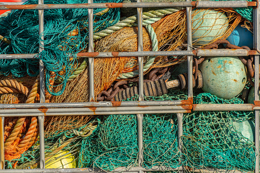 Fishing trawl stored in a container.