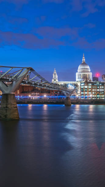 istock Millennium Bridge and St. Paul's cathedral at dusk, long shutter speed 1311982636