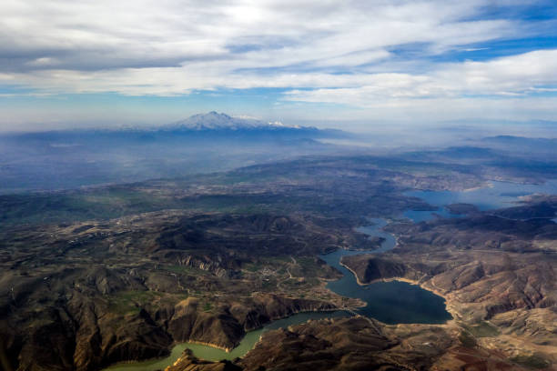 istock Tourist Plane Trip, Lake Mountain And Sky View 1311985372