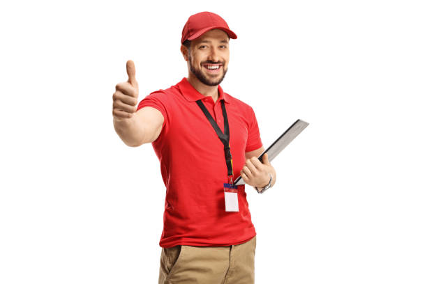istock Male shop assistant gesturing a thumb up sign 1311985832