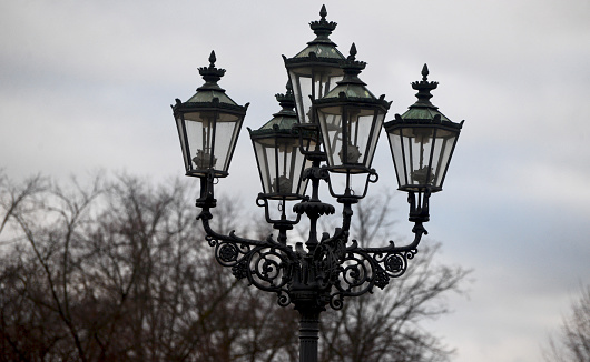 Traditional electric lamps around a city streets