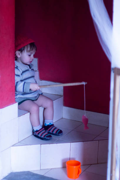 istock child playing on the ladder 1311989892