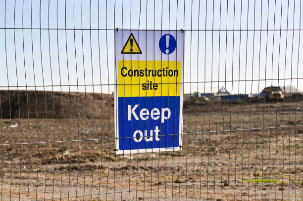 istock Keep out signs on the fence around a construction site 1311991485