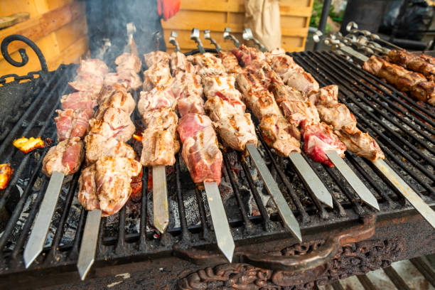 istock meat on skewers an open fire 1311993168