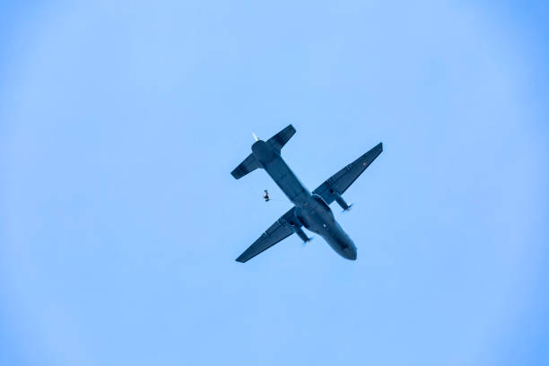 Soldiers jumps from military airplane at the training.