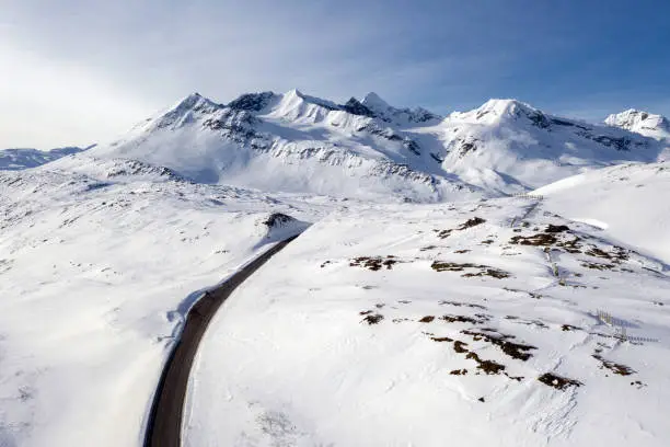Aerial view of the Richardson Highway at Thompson Pass near Valdez, Alaska during the winter.