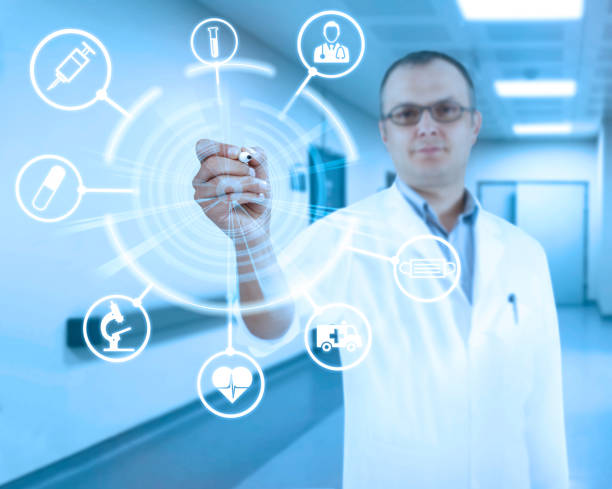 istock Doctor writing on transparent board 1311996694