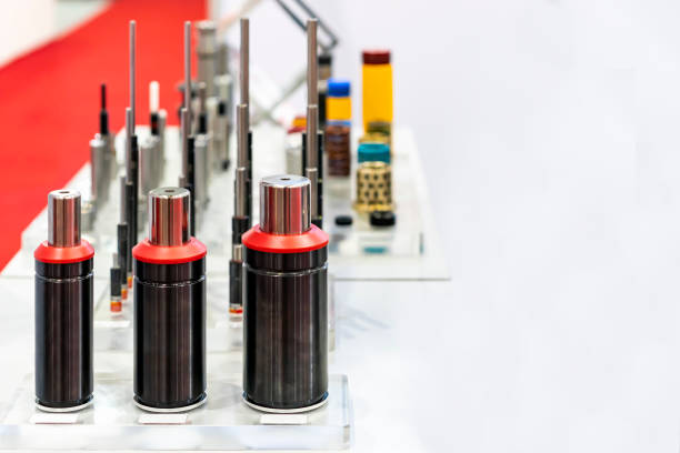 istock Various type and size nitrogen gas spring shock absorber for injection plastic mold and die casting moulds or machine in industrial on table copy space 1311996933