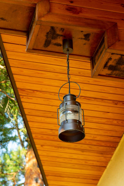 istock modern street lamp suspended by a chain 1311997967