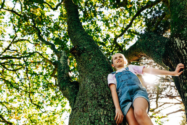 istock Girl playing in forrest 1312000405