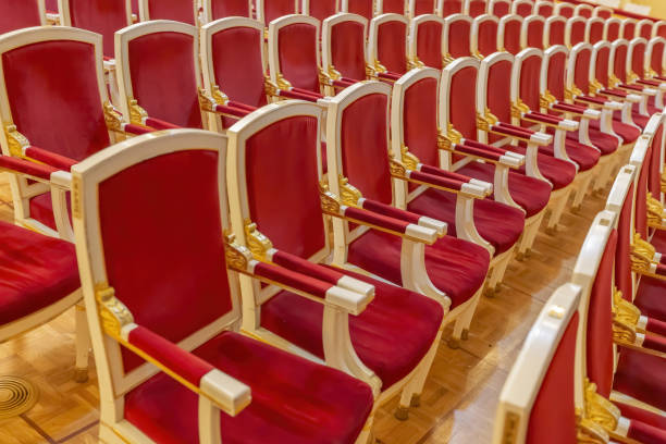 Empty red seats in the theater auditorium