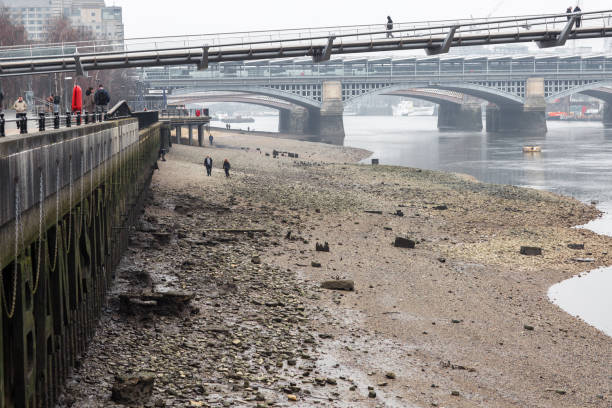 London, UK - March 2, 2021: London embankment river Thames. Empty streets no people, London during national lockdown Covid 19