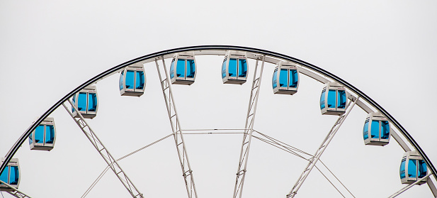 Helsinki, Finland - mar 2015 : detail of the giant vertical revolving wheel with passenger cars suspended on its outer edge in the port of Helsinki in Finland