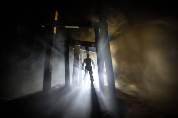 istock Creative artwork decoration. Abstract Japanese style wooden tunnel at night. Selective focus 1312013470