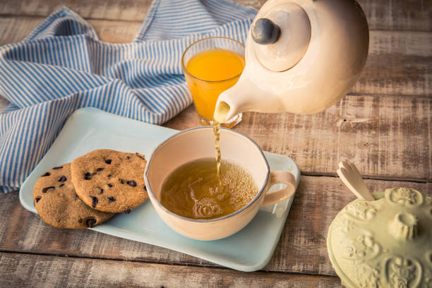 istock Breackfast tea With tea and cookies 1312014311
