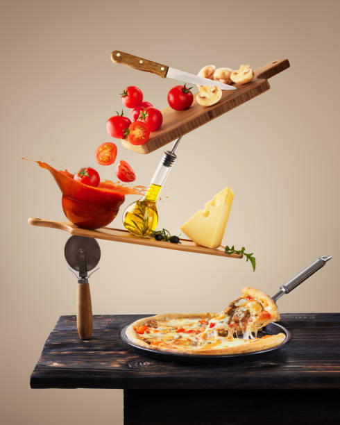 istock Balancing ingredients for making pizza. Levitation tomatoes. Conceptual food. Modern design. Contemporary art collage. Concept of fast food, breakfast, lunch. 1312017141
