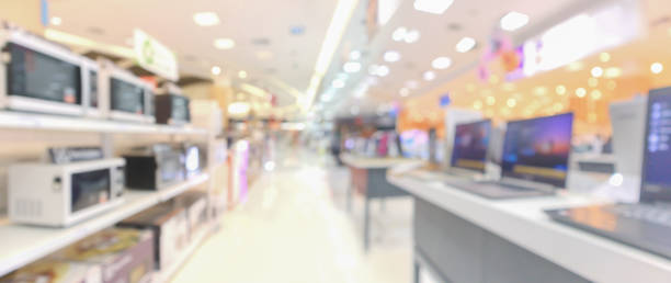 istock electronic department store show laptop computer and home appliance with bokeh light blurred background 1312021949