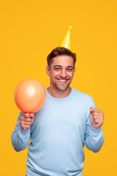 istock Happy man with party accessories 1312022127