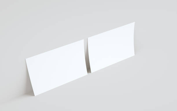 istock A4 Flyer / Letterhead Mock-Up - Two Flyers Against Wall Background 1312022423