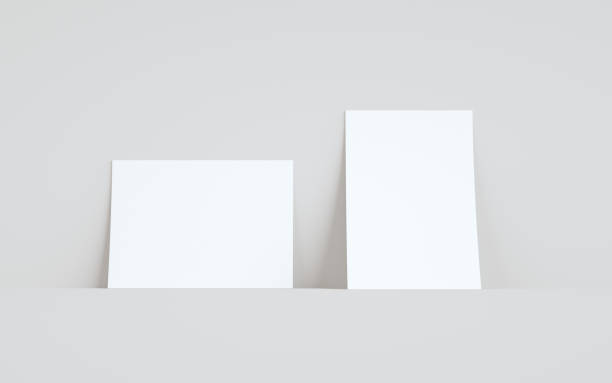istock A5 Flyer / Brochure Mock-Up - Two Flyers Against Wall Background 1312022426