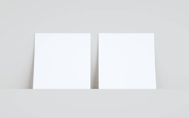 istock Square Flyer Mock-Up - Two Flyers Against Wall Background 1312022428