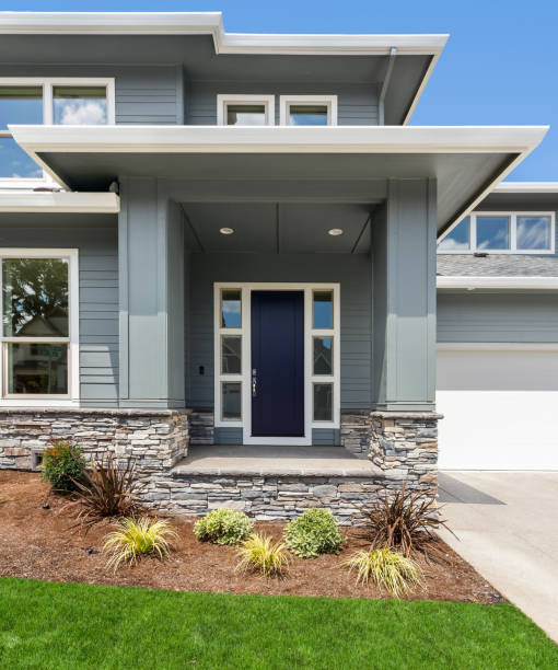 front door detail of new suburban home - stone contemporary house luxury imagens e fotografias de stock