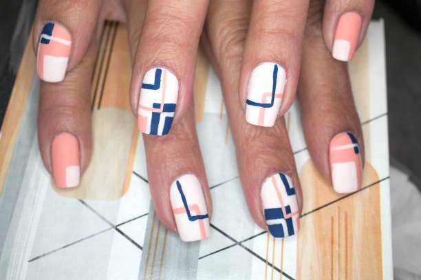 istock Peach and Navy Nail Art Design 1312032179