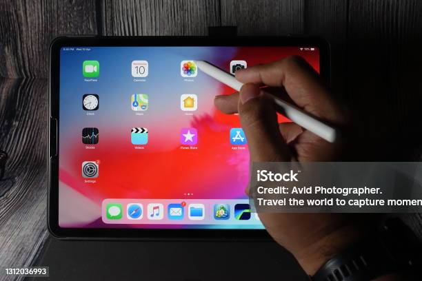 Apple Ipad Pro With Magic Keyboard And Apple Pencil Stock Photo - Download Image Now