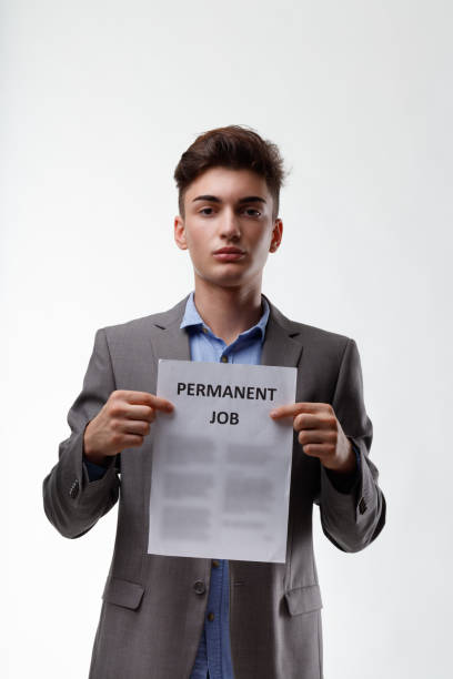 istock Smart young graduate in a jacket seeking a Permanent Job 1312041615